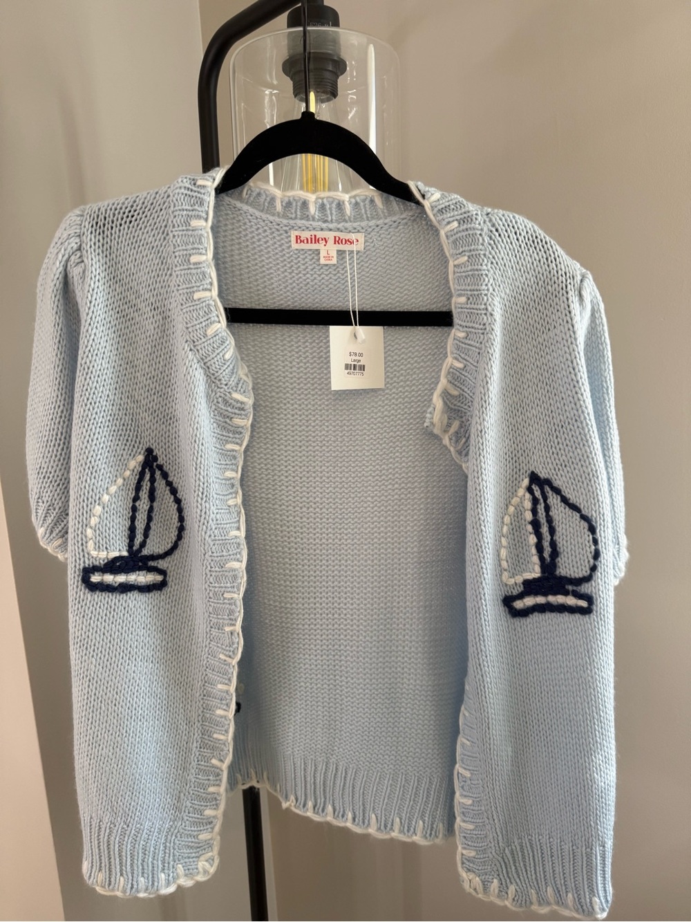 New with Tags!
Bailey Rose Pale Blue Knit Cardigan with Sailboat Embroidery